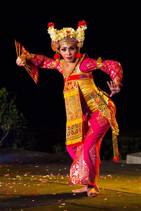 Man in traditional costume performing dance in Indonesia